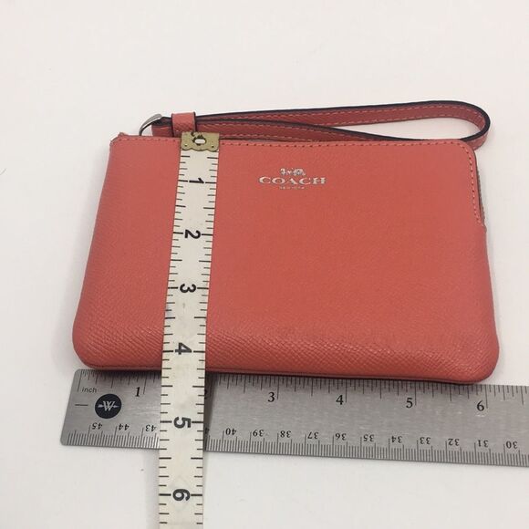 Coach Salmon Pebbled Leather Wristlet with silver tone hardware - Picture 12 of 16